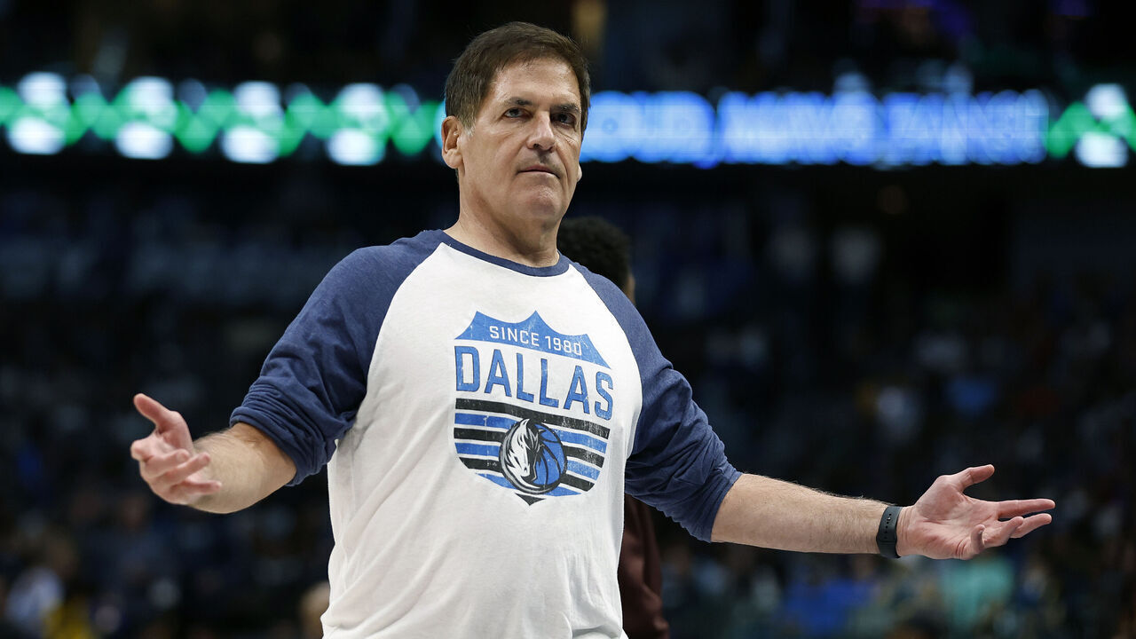 DALLAS, TEXAS - MARCH 22: Dallas Mavericks owner Mark Cuban reacts during a timeout in the game against the Golden State Warriors at American Airlines Center on March 22, 2023 in Dallas, Texas.
