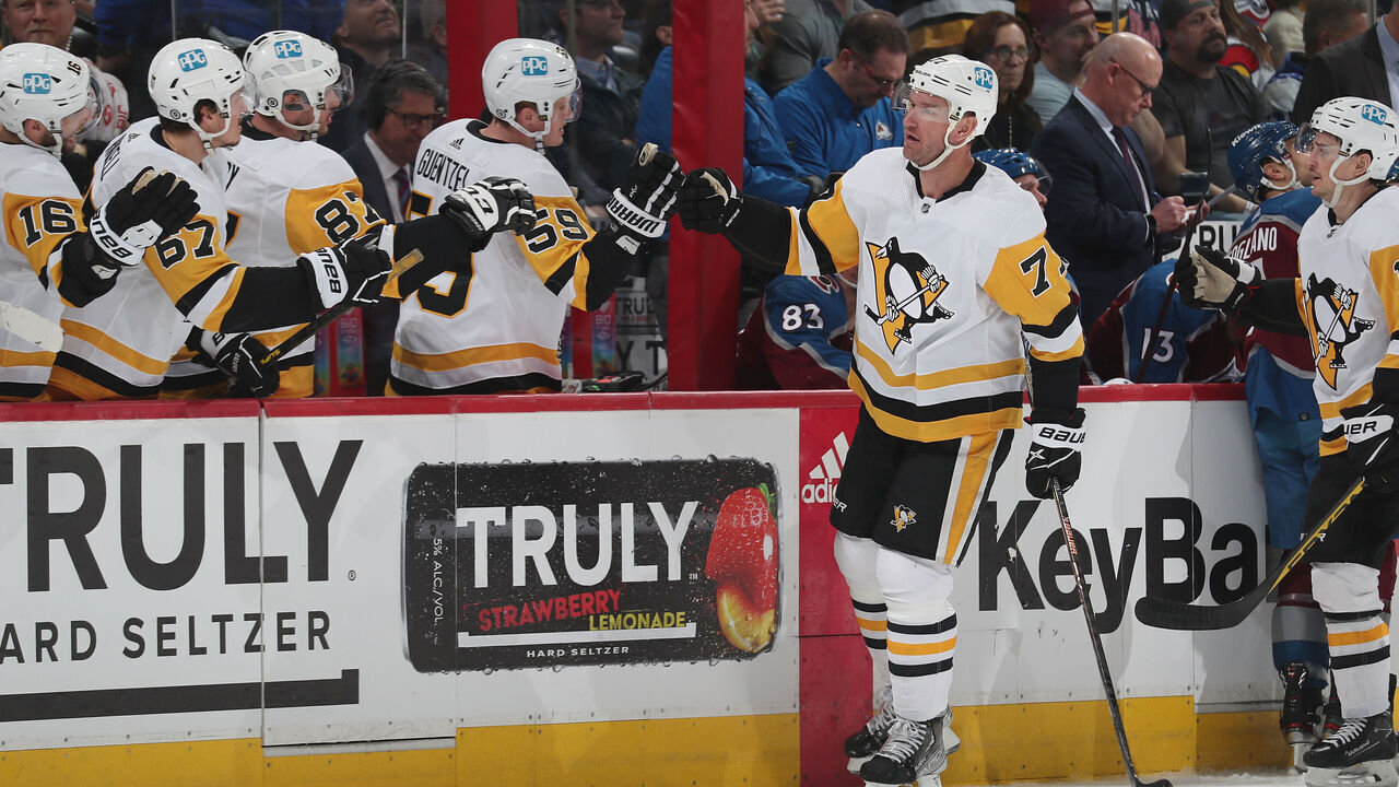 DENVER, COLORADO - MARCH 22: Jeff Carter #77 of the Pittsburgh Penguins celebrates a goal against the Colorado Avalanche with his bench at Ball Arena on March 22, 2023 in Denver, Colorado. The Penguins defeated the Avalanche 5-2.