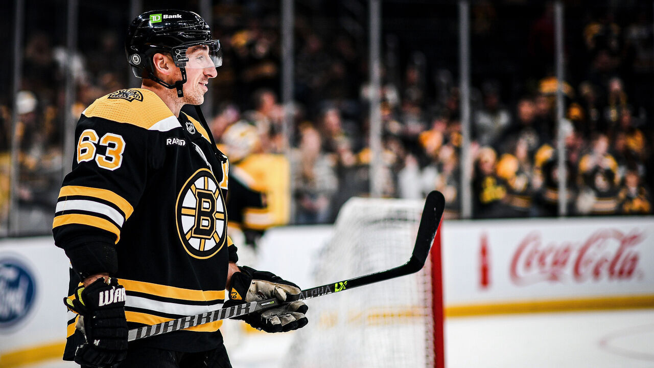 BOSTON, MASSACHUSETTS - MARCH 21: Brad Marchand #63 of the Boston Bruins smiles during warm-up before a game against the Ottawa Senators at TD Garden on March 21, 2023 in Boston, Massachusetts.
