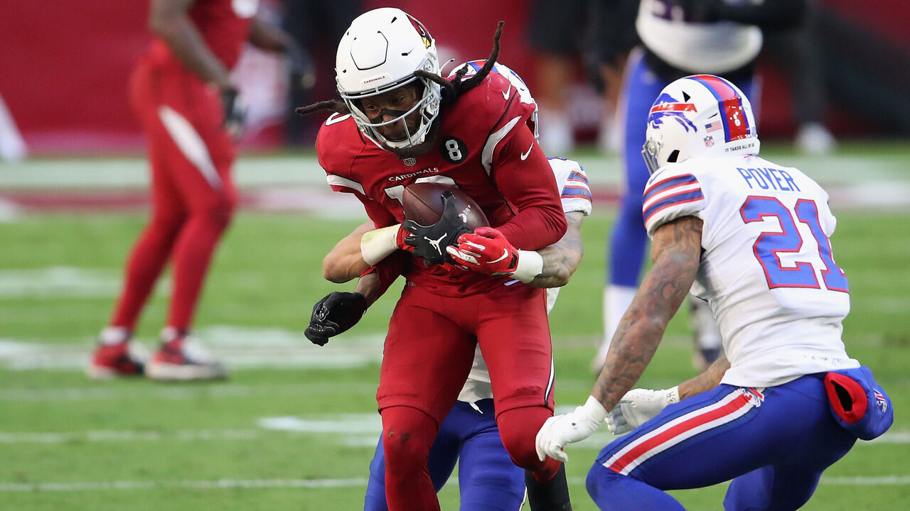 GLENDALE, ARIZONA - NOVEMBER 15: Wide receiver DeAndre Hopkins #10 of the Arizona Cardinals runs with the football after a reception against free safety Jordan Poyer #21 of the Buffalo Bills during the NFL game at State Farm Stadium on November 15, 2020 in Glendale, Arizona. The Cardinals defeated the Bills 32-30.