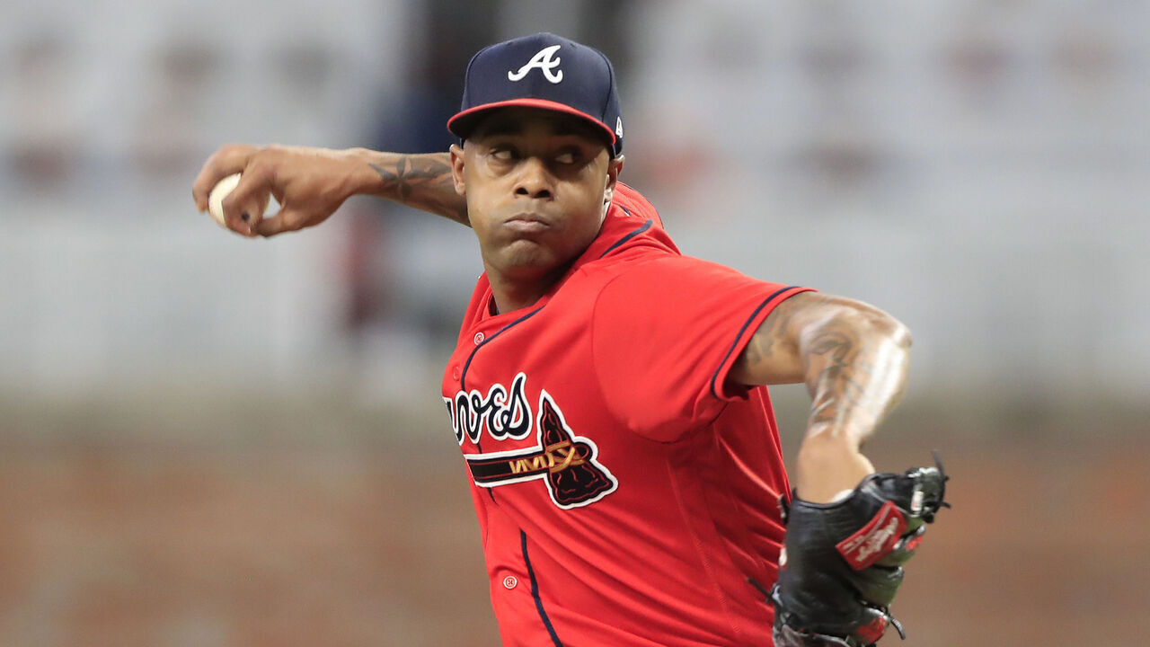 ATLANTA, GA - SEPTEMBER 30: Atlanta Braves relief pitcher Raisel Iglesias (26) delivers a pitch during the Friday evening MLB game between the New York Mets and the Atlanta Braves on September 30, 2022 at Truist Park in Atlanta, Georgia.