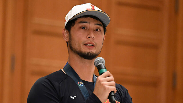 MIAMI, FLORIDA - MARCH 21: Yu Darvish #11 of Team Japan talks in the post game press conference after the World Baseball Classic Championship against Team USA at loanDepot park on March 21, 2023 in Miami, Florida.