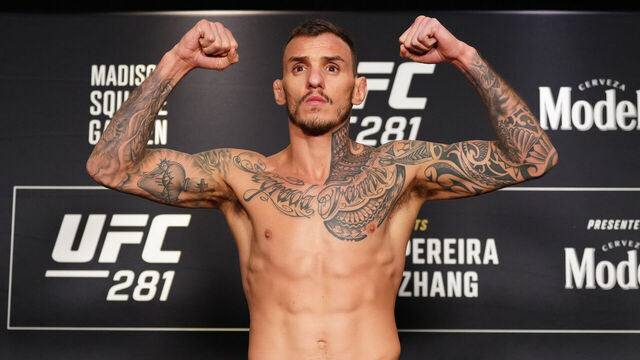 NEW YORK, NEW YORK - NOVEMBER 11: Renato Moicano of Brazil poses on the scale during the UFC 281 official weigh-in at the Marriott Marquis Hotel on November 11, 2022 in New York City.