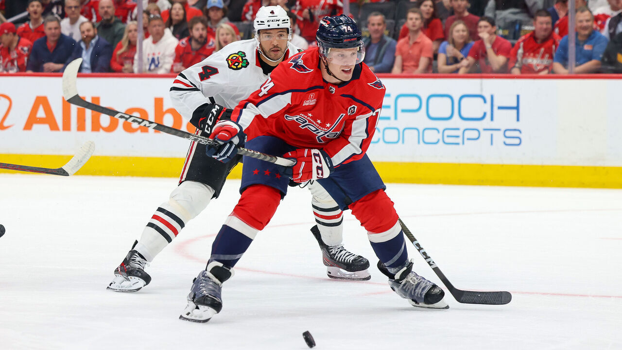 WASHINGTON, DC - MARCH 23: John Carlson #74 of the Washington Capitals looks to take a shot on net during a game against the Chicago Blackhawks at Capital One Arena on March 23, 2023 in Washington, D.C.