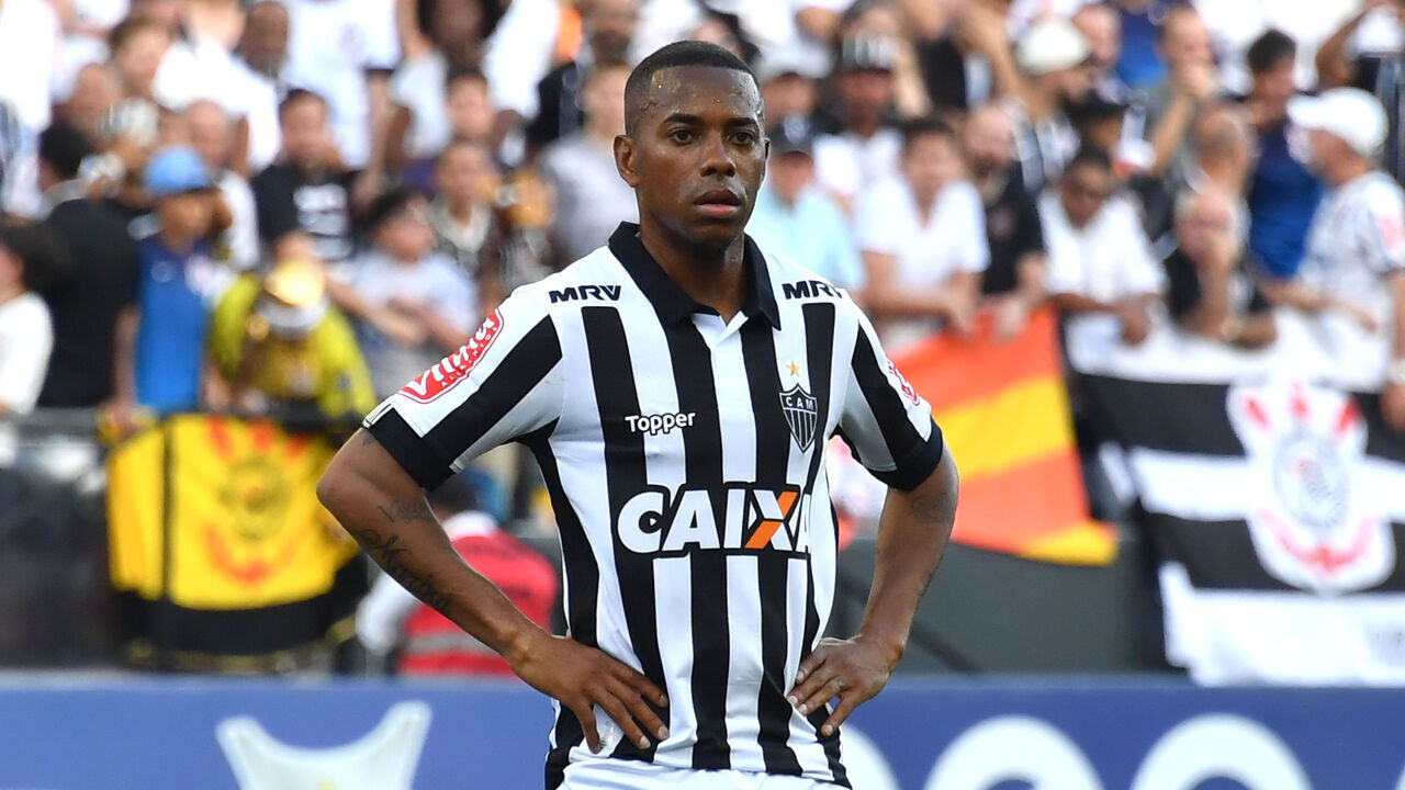 Atletico Mineiro player Robinho is seen during the Brazilian Championship football match against Corinthians at the Arena Corinthians stadium on November 26, 2017, in Sao Paulo, Brazil. A Milan court on November 23, 2017 sentenced former AC Milan and Brazil forward Robinho aka Robson de Souza Santos to nine years in jail for taking part in the gang-rape of a 22-year-old Albanian woman in a Milan disco on January 22, 2013. Robinho, who is now playing for the Brazilian team Atletico Mineiro, was found guilty of committing the rape with five other people. / AFP PHOTO / NELSON ALMEIDA