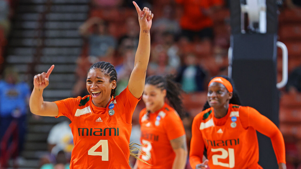 GREENVILLE, SOUTH CAROLINA - MARCH 24: Jasmyne Roberts #4 of the Miami Hurricanes celebrates after the Miami Hurricanes beat the Villanova Wildcats 70-65 in the Sweet 16 round of the NCAA Women's Basketball Tournament at Bon Secours Wellness Arena on March 24, 2023 in Greenville, South Carolina.