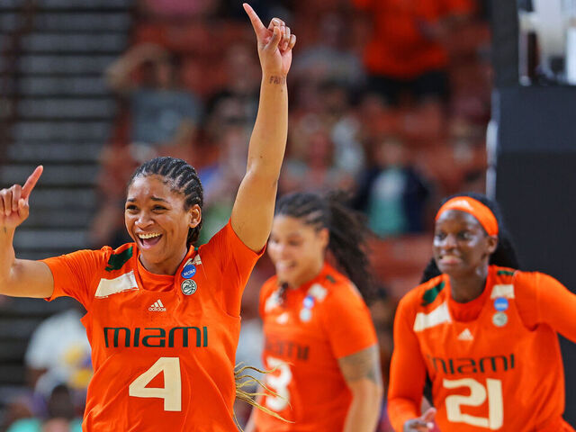 GREENVILLE, SOUTH CAROLINA - MARCH 24: Jasmyne Roberts #4 of the Miami Hurricanes celebrates after the Miami Hurricanes beat the Villanova Wildcats 70-65 in the Sweet 16 round of the NCAA Women's Basketball Tournament at Bon Secours Wellness Arena on March 24, 2023 in Greenville, South Carolina.