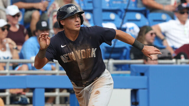 DUNEDIN, FL - FEBRUARY 26: New York Yankees infielder Anthony Volpe (77) hustles home from third base during the spring training game between the New York Yankees and the Toronto Blue Jays on February 26, 2023, at the TD Ballpark in Dunedin, FL.