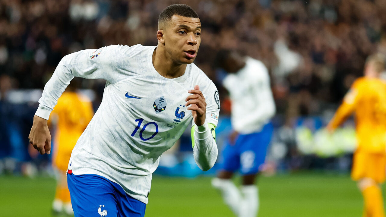 SAINT-DENIS, FRANCE - MARCH 24: Kylian Mbappe of France celebrates after scoring his sides third goal during the UEFA EURO 2024 Qualifying Round Group B match between France and Netherlands at Stade de France on March 24, 2023 in Saint-Denis, France