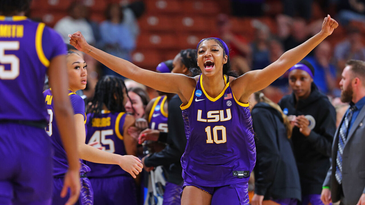 GREENVILLE, SOUTH CAROLINA - MARCH 24: Angel Reese #10 of the LSU Lady Tigers celebrates after the LSU Lady Tigers beat the Utah Utes 66-63 in the Sweet 16 round of the NCAA Women's Basketball Tournament at Bon Secours Wellness Arena on March 24, 2023 in Greenville, South Carolina.