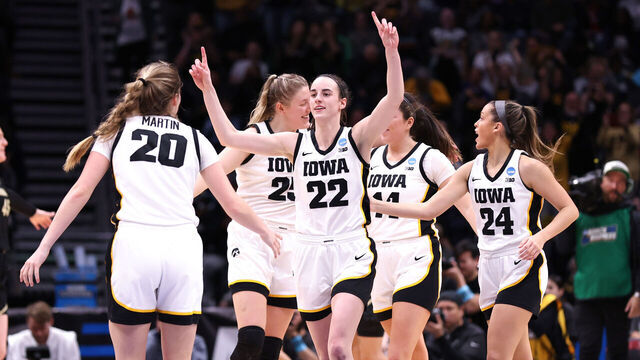 SEATTLE, WASHINGTON - MARCH 24: Caitlin Clark #22 of the Iowa Hawkeyes celebrates after defeating the Colorado Buffaloes in the Sweet 16 round of the NCAA Women's Basketball Tournament at Climate Pledge Arena on March 24, 2023 in Seattle, Washington.