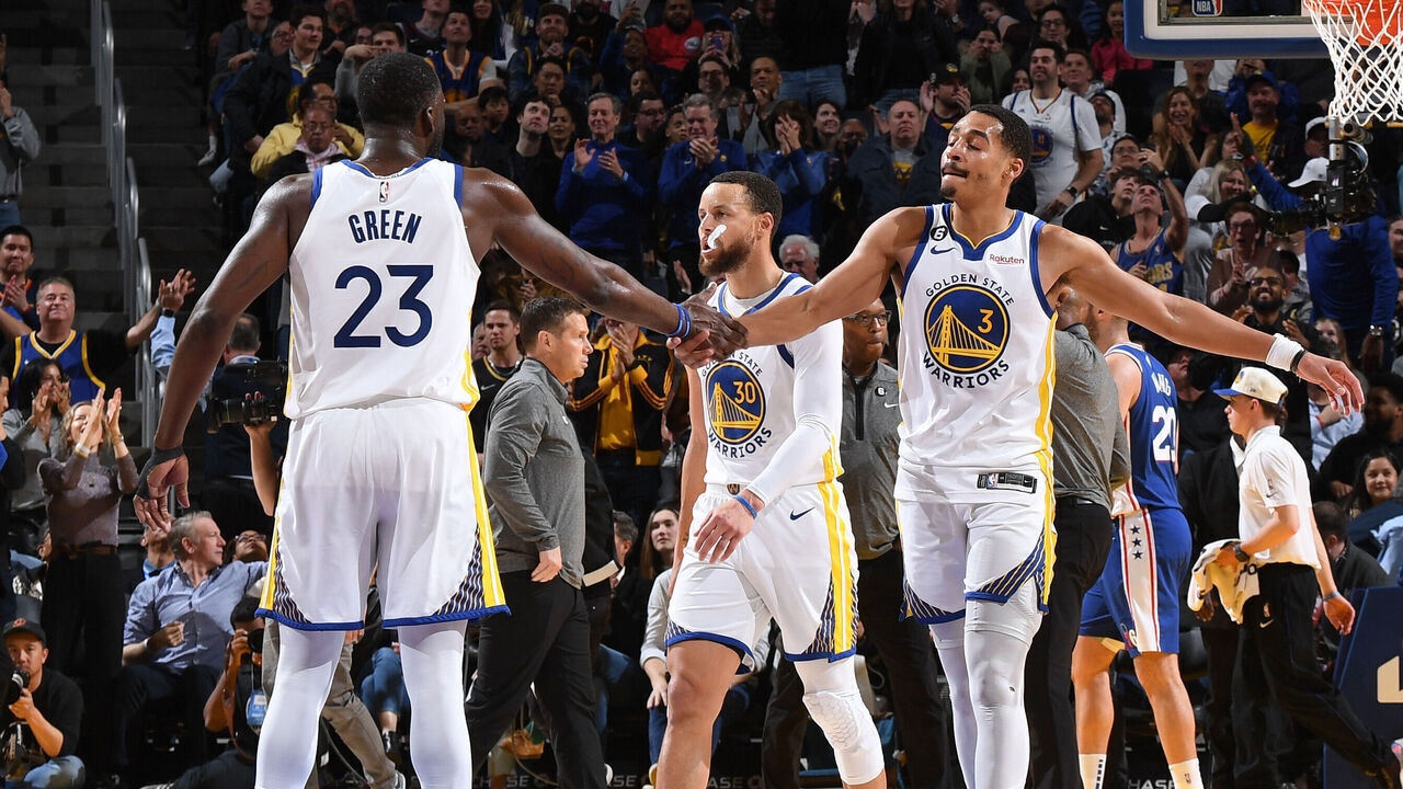 SAN FRANCISCO, CA - MARCH 24: Draymond Green #23 and Jordan Poole #3 of the Golden State Warriors high five during the game against the Philadelphia 76ers on March 24, 2023 at Chase Center in San Francisco, California. NOTE TO USER: User expressly acknowledges and agrees that, by downloading and or using this photograph, user is consenting to the terms and conditions of Getty Images License Agreement. Mandatory Copyright Notice: Copyright 2023 NBAE