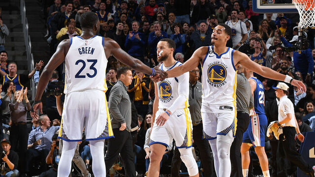 SAN FRANCISCO, CA - MARCH 24: Draymond Green #23 and Jordan Poole #3 of the Golden State Warriors high five during the game against the Philadelphia 76ers on March 24, 2023 at Chase Center in San Francisco, California. NOTE TO USER: User expressly acknowledges and agrees that, by downloading and or using this photograph, user is consenting to the terms and conditions of Getty Images License Agreement. Mandatory Copyright Notice: Copyright 2023 NBAE