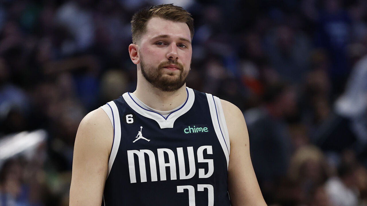 DALLAS, TEXAS - MARCH 22: Luka Doncic #77 of the Dallas Mavericks reacts on the court in the second half against the Golden State Warriors at American Airlines Center on March 22, 2023 in Dallas, Texas.