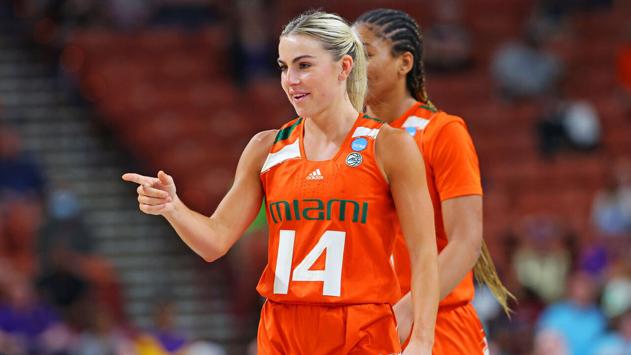 GREENVILLE, SOUTH CAROLINA - MARCH 24: Haley Cavinder #14 of the Miami Hurricanes reacts during the second half against the Utah Utes in the Sweet 16 round of the NCAA Women's Basketball Tournament at Bon Secours Wellness Arena on March 24, 2023 in Greenville, South Carolina.