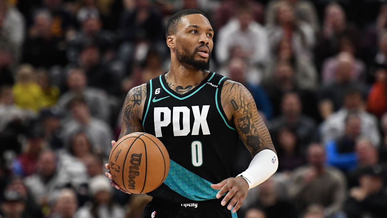 SALT LAKE CITY, UTAH - MARCH 22: Damian Lillard #0 of the Portland Trail Blazers brings the ball up court during the second half against the Utah Jazz at Vivint Arena on March 22, 2023 in Salt Lake City, Utah.