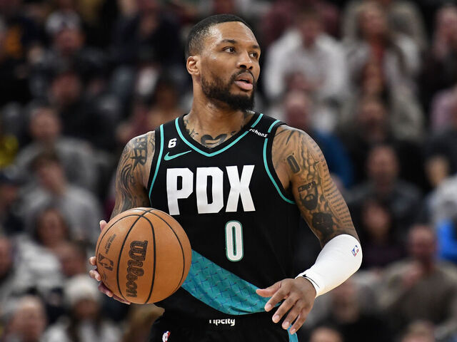 SALT LAKE CITY, UTAH - MARCH 22: Damian Lillard #0 of the Portland Trail Blazers brings the ball up court during the second half against the Utah Jazz at Vivint Arena on March 22, 2023 in Salt Lake City, Utah.