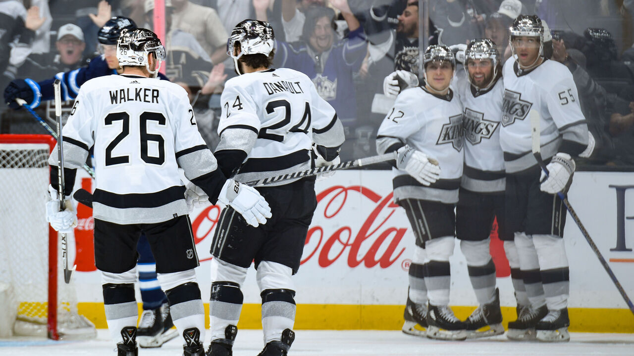 LOS ANGELES, CA - MARCH 25: Alex Iafallo #19 of the Los Angeles Kings celebrates his goal with teammates during the second period against the Winnipeg Jets at Crypto.com Arena on March 25, 2023 in Los Angeles, California.