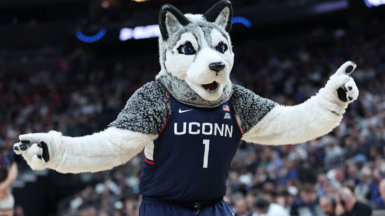 LAS VEGAS, NEVADA - MARCH 25: Connecticut Huskies mascot Jonathan the Husky performs during the game against the Gonzaga Bulldogs in the Elite Eight round of the NCAA Men's Basketball Tournament at T-Mobile Arena on March 25, 2023 in Las Vegas, Nevada.