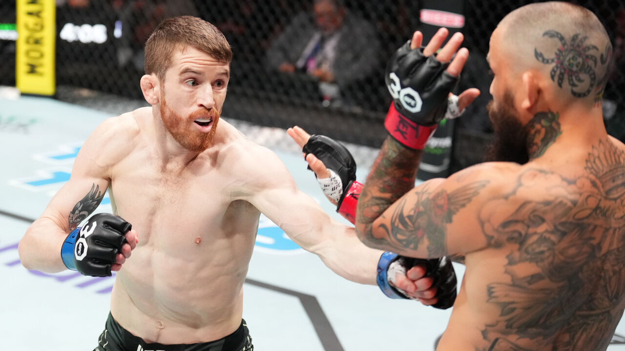 SAN ANTONIO, TEXAS - MARCH 25: (L-R) Cory Sandhagen punches Marlon Vera of Ecuador in a bantamweight fight during the UFC Fight Night event at AT&T Center on March 25, 2023 in San Antonio, Texas.