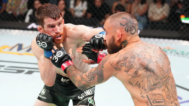 SAN ANTONIO, TEXAS - MARCH 25: (L-R) Cory Sandhagen punches Marlon Vera of Ecuador in a bantamweight fight during the UFC Fight Night event at AT&T Center on March 25, 2023 in San Antonio, Texas.