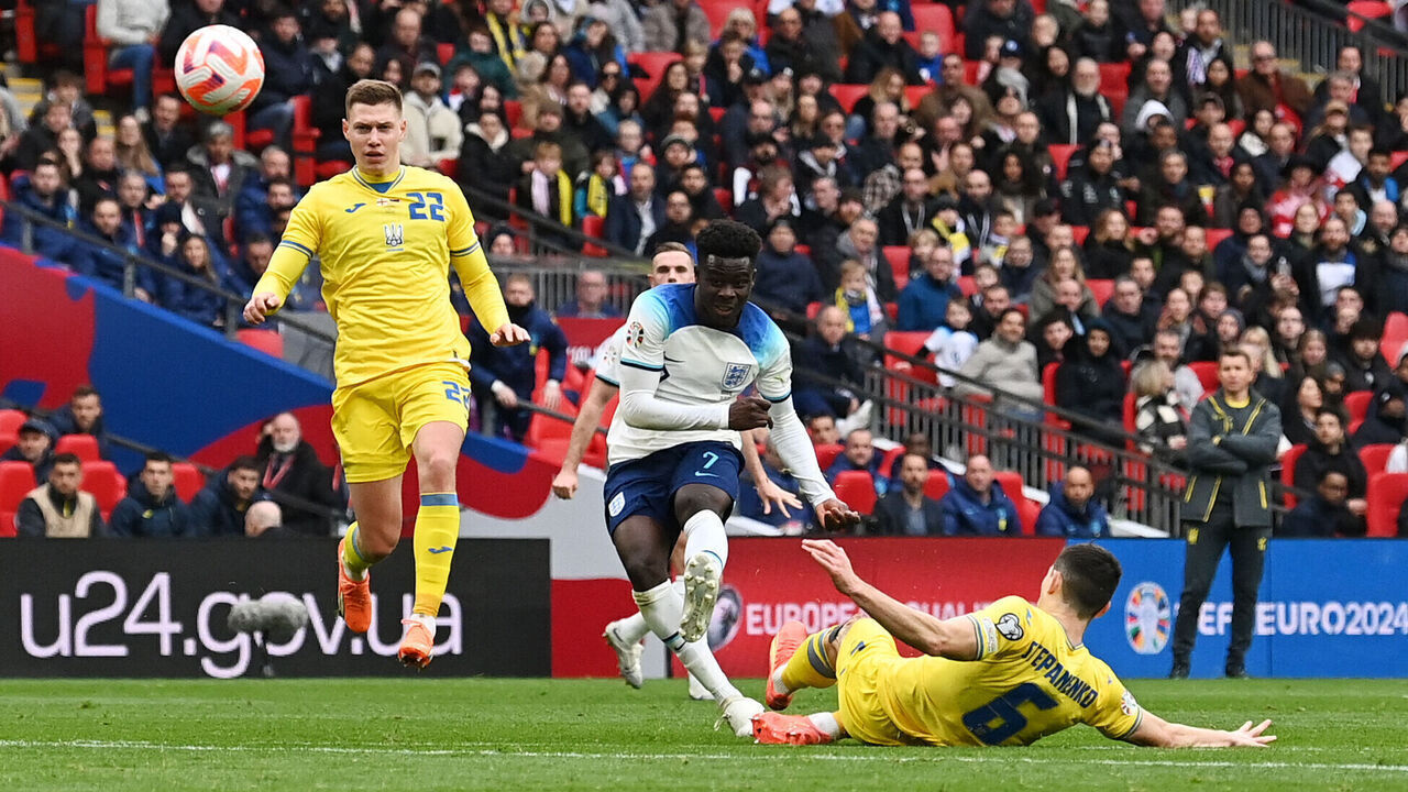 England's midfielder Bukayo Saka scores his team's second goal during the UEFA Euro 2024 group C qualification football match between England and Ukraine at Wembley Stadium in London on March 26, 2023.