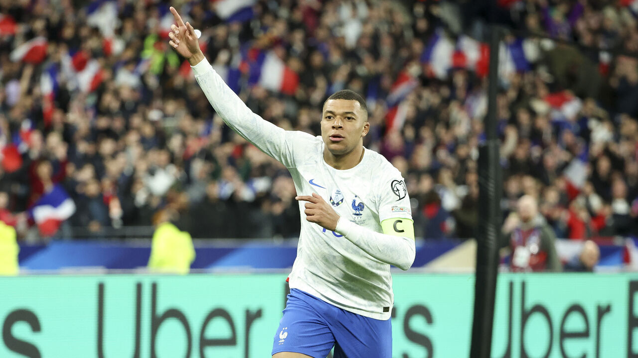PARIS, FRANCE - MARCH 24: Kylian Mbappe of France celebrates his first goal during the UEFA EURO 2024 qualifying round group B match between France and Netherlands at Stade de France on March 24, 2023 in Saint-Denis near Paris, France.