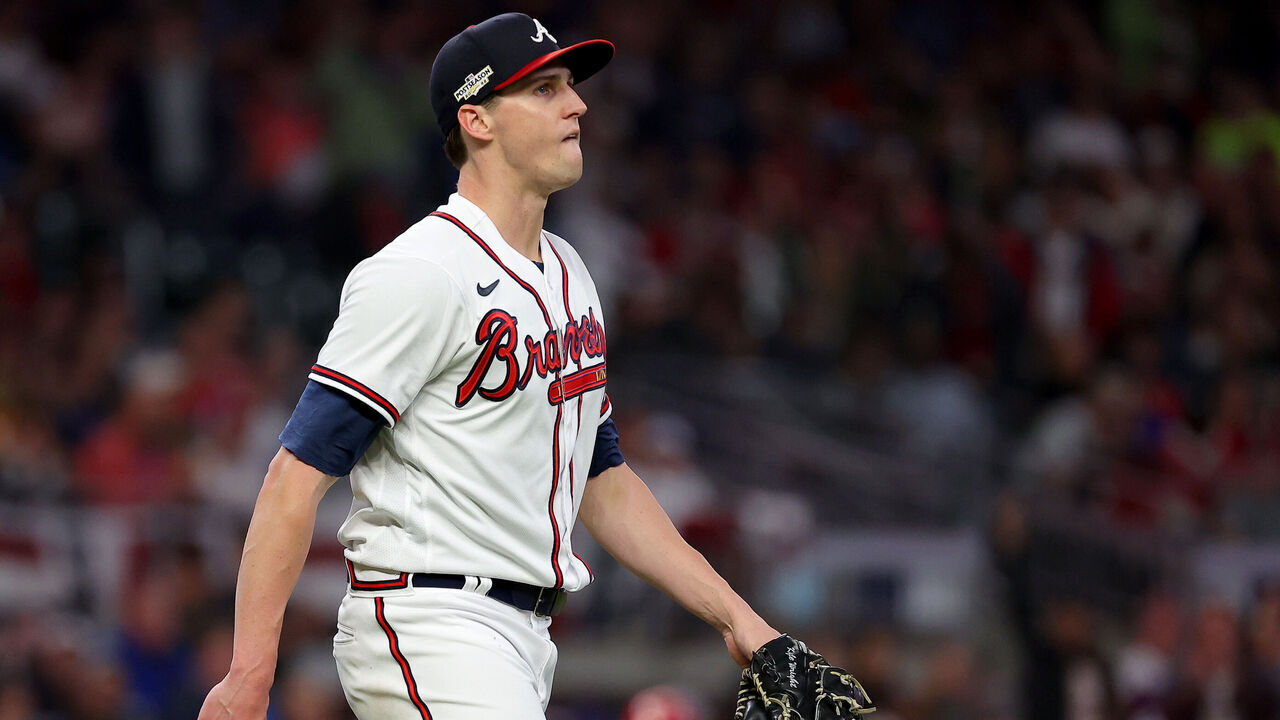 ATLANTA, GEORGIA - OCTOBER 12: Kyle Wright #30 of the Atlanta Braves reacts after striking out Rhys Hoskins #17 of the Philadelphia Phillies during the seventh inning in game two of the National League Division Series at Truist Park on October 12, 2022 in Atlanta, Georgia.