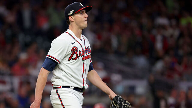 ATLANTA, GEORGIA - OCTOBER 12: Kyle Wright #30 of the Atlanta Braves reacts after striking out Rhys Hoskins #17 of the Philadelphia Phillies during the seventh inning in game two of the National League Division Series at Truist Park on October 12, 2022 in Atlanta, Georgia.