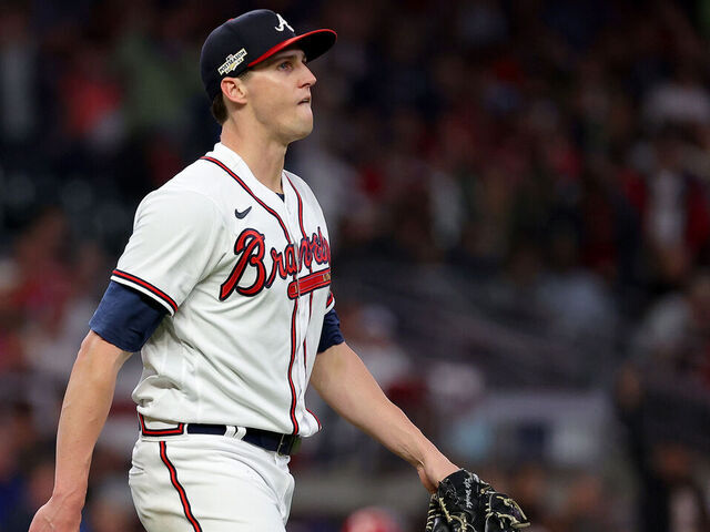 ATLANTA, GEORGIA - OCTOBER 12: Kyle Wright #30 of the Atlanta Braves reacts after striking out Rhys Hoskins #17 of the Philadelphia Phillies during the seventh inning in game two of the National League Division Series at Truist Park on October 12, 2022 in Atlanta, Georgia.