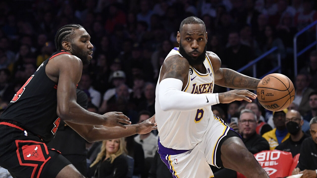 LOS ANGELES, CA - MARCH 26: LeBron James #6 of the Los Angeles Lakers drives around Patrick Williams #44 of the Chicago Bulls during the first half at Crypto.com Arena on March 26, 2023 in Los Angeles, California.