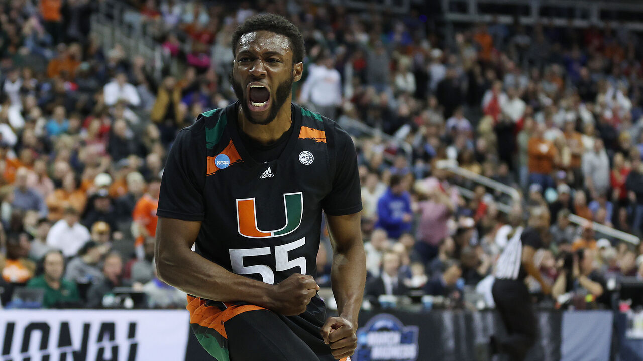 KANSAS CITY, MISSOURI - MARCH 26: Wooga Poplar #55 of the Miami Hurricanes reacts after dunking the ball during the second half against the Texas Longhorns in the Elite Eight round of the NCAA Men's Basketball Tournament at T-Mobile Center on March 26, 2023 in Kansas City, Missouri.