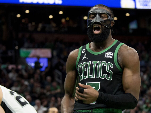 BOSTON, MA - MARCH 26: Jaylen Brown #7 of the Boston Celtics reacts during the second half of a game against the San Antonio Spurs at TD Garden on March 26, 2023 in Boston, Massachusetts.