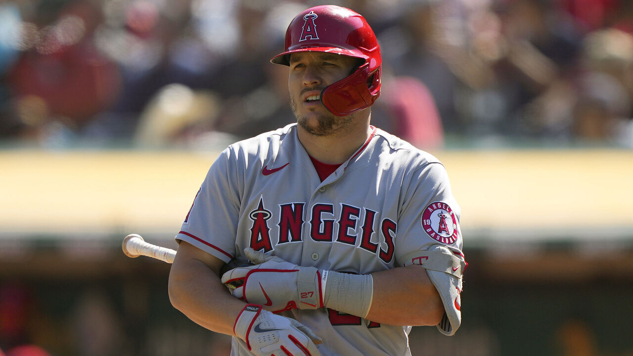 OAKLAND, CALIFORNIA - OCTOBER 05: Mike Trout #27 of the Los Angeles Angels looks on before stepping back into the batter box against the Oakland Athletics in the top of the first inn at RingCentral Coliseum on October 05, 2022 in Oakland, California.