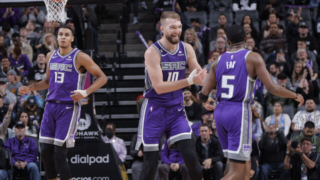 SACRAMENTO, CA - DECEMBER 30: Domantas Sabonis #10 of the Sacramento Kings celebrates with DeAaron Fox #5 during the game against the Utah Jazz on December 30, 2022 at Golden 1 Center in Sacramento, California. NOTE TO USER: User expressly acknowledges and agrees that, by downloading and or using this photograph, User is consenting to the terms and conditions of the Getty Images Agreement. Mandatory Copyright Notice: Copyright 2022 NBAE