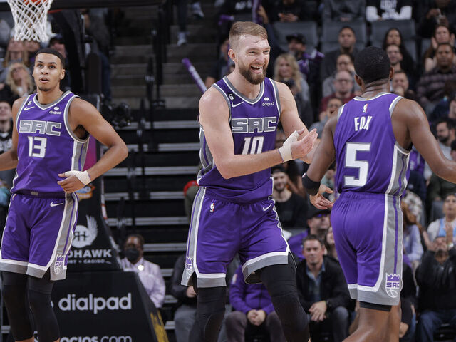 SACRAMENTO, CA - DECEMBER 30: Domantas Sabonis #10 of the Sacramento Kings celebrates with DeAaron Fox #5 during the game against the Utah Jazz on December 30, 2022 at Golden 1 Center in Sacramento, California. NOTE TO USER: User expressly acknowledges and agrees that, by downloading and or using this photograph, User is consenting to the terms and conditions of the Getty Images Agreement. Mandatory Copyright Notice: Copyright 2022 NBAE