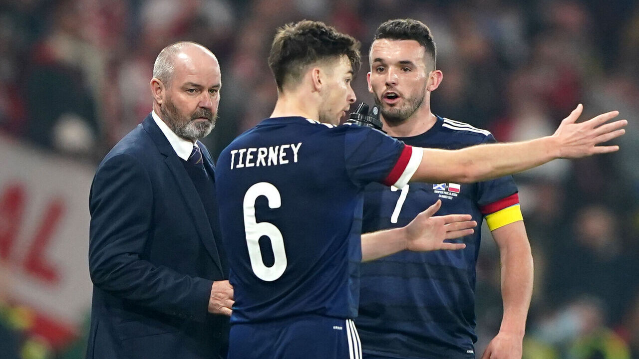 Scotland manager Steve Clarke talks with players John McGinn (right) and Kieran Tierney during the International Friendly match at Hampden Park, Glasgow. Picture date: Thursday March 24, 2022.