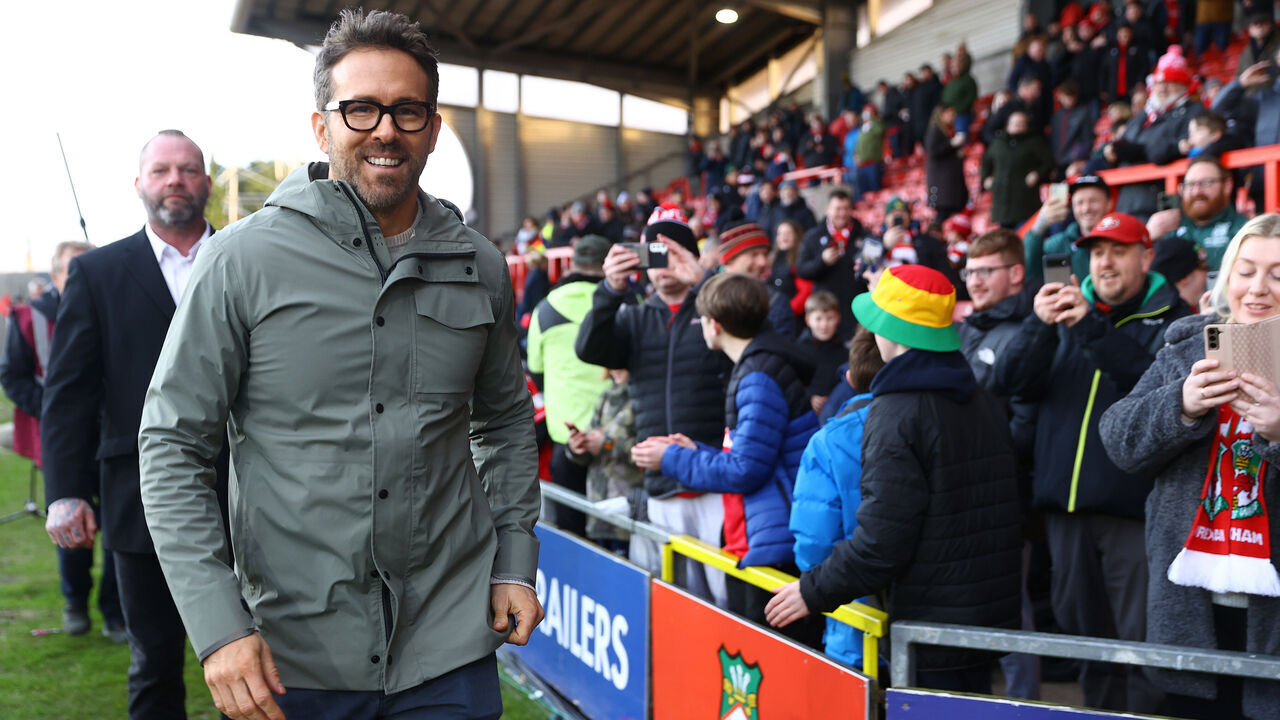 WREXHAM, WALES - JANUARY 29: Ryan Reynolds, Co-Owner of Wrexham pitchside ahead of the Emirates FA Cup Fourth Round match between Wrexham and Sheffield United at Racecourse Ground on January 29, 2023 in Wrexham, Wales.