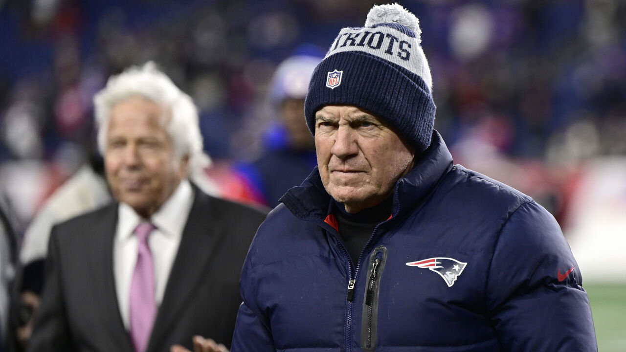 FOXBOROUGH, MASSACHUSETTS - DECEMBER 01: New England Patriots owner Robert Craft (L) and head coach Bill Belichick look on during warm ups before the start of the Patriots and Buffalo Bills game at Gillette Stadium on December 01, 2022 in Foxborough, Massachusetts.