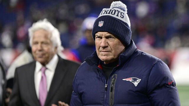 FOXBOROUGH, MASSACHUSETTS - DECEMBER 01: New England Patriots owner Robert Craft (L) and head coach Bill Belichick look on during warm ups before the start of the Patriots and Buffalo Bills game at Gillette Stadium on December 01, 2022 in Foxborough, Massachusetts.