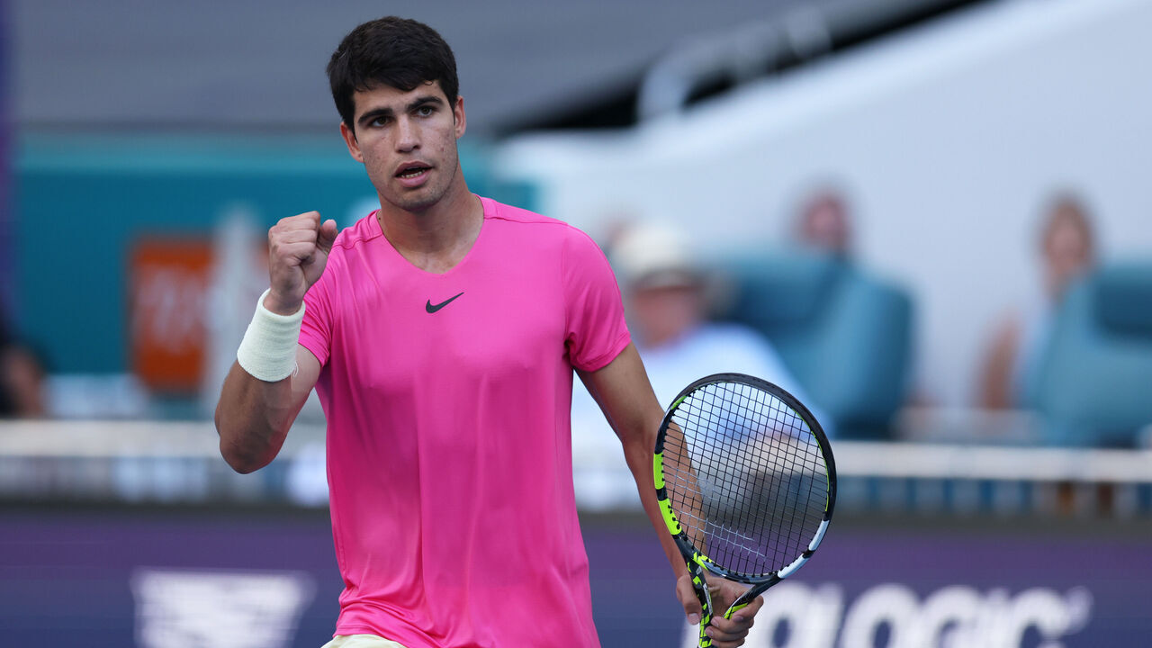 MIAMI GARDENS, FLORIDA - MARCH 26: Carlos Alcaraz of Spain celebrates a point against Dusan Lajovic of Serbia in their third round match at Hard Rock Stadium on March 26, 2023 in Miami Gardens, Florida.