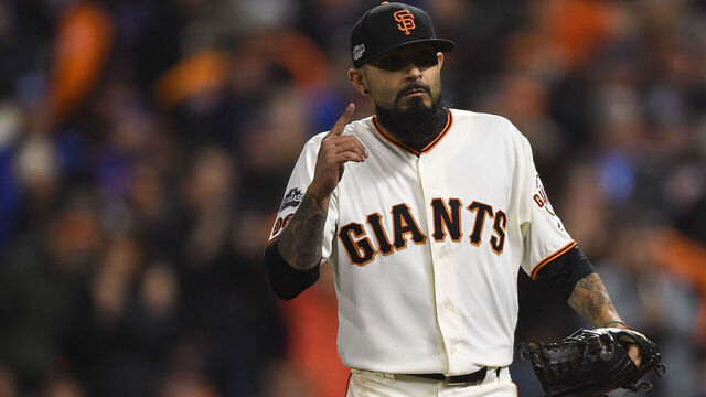 SAN FRANCISCO, CA - OCTOBER 10: Sergio Romo #54 of the San Francisco Giants reacts in the tenth inning against the Chicago Cubs during Game Three of their National League Division Series against the Chicago Cubs at AT&T Park on October 10, 2016 in San Francisco, California.
