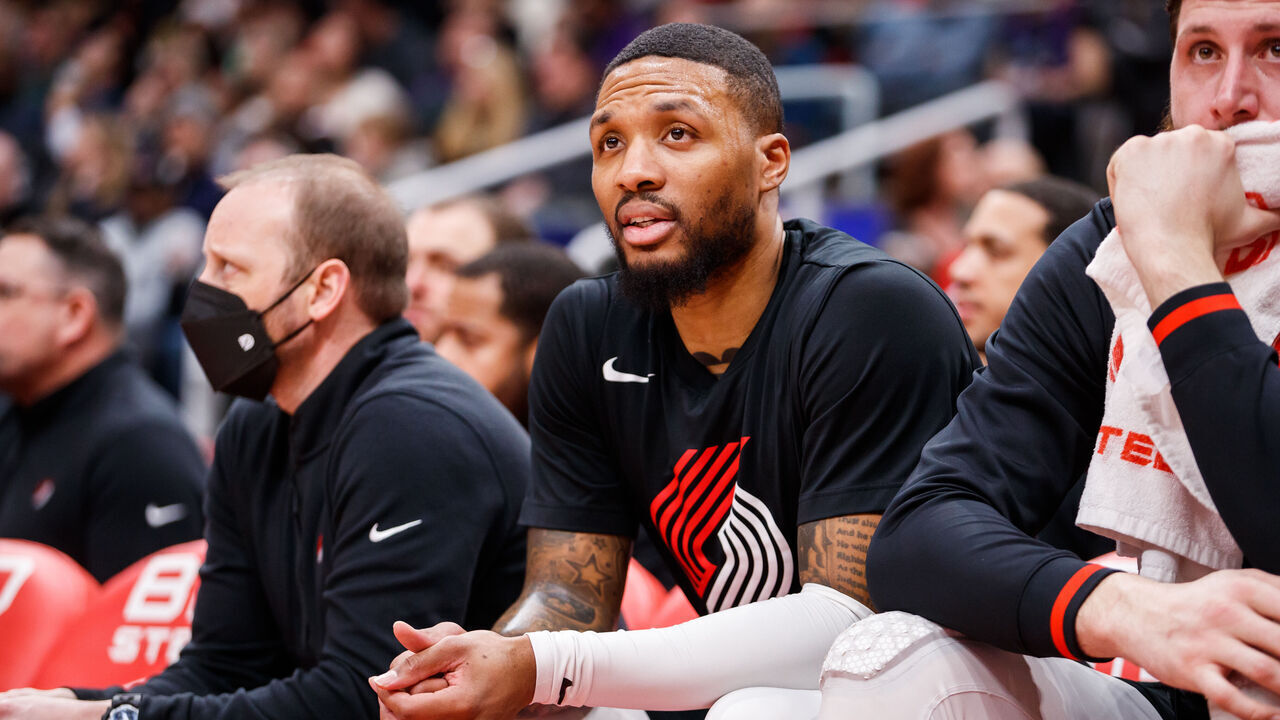 TORONTO, ON - JANUARY 08: Damian Lillard #0 of the Portland Trail Blazers reacts from the bench during the first half of their NBA game against the Toronto Raptors at Scotiabank Arena on January 8, 2023 in Toronto, Canada.