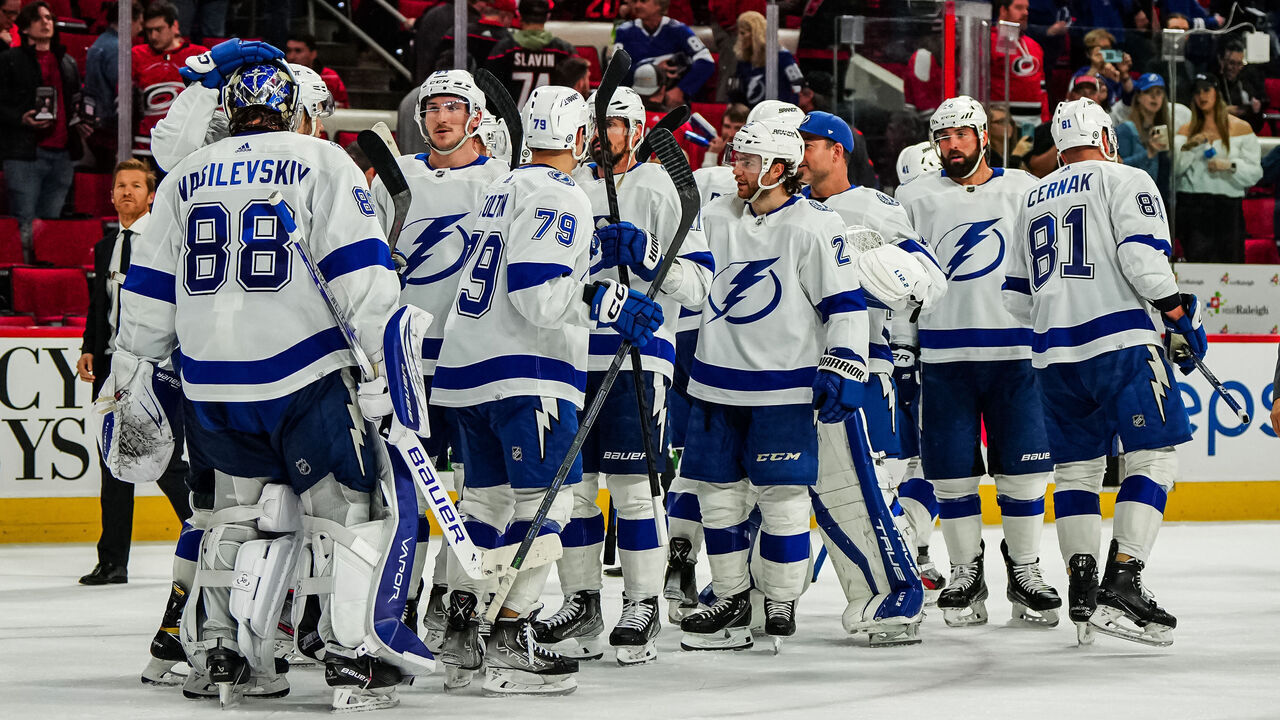 RALEIGH, NORTH CAROLINA - MARCH 28: The Tampa Bay Lightning celebrate after defeating the Carolina Hurricanes at PNC Arena on March 28, 2023 in Raleigh, North Carolina.