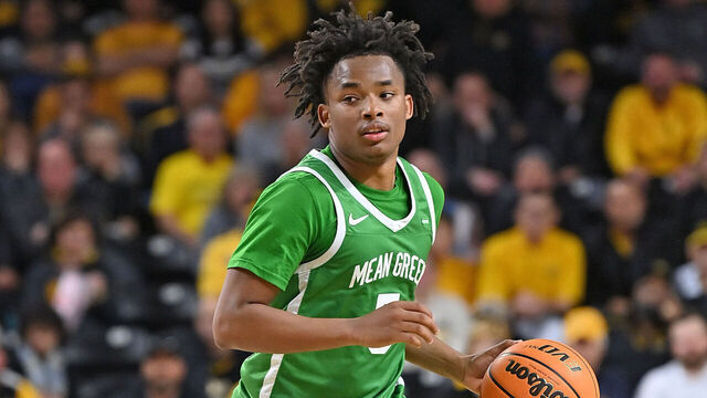 WICHITA, KS - DECEMBER 18: Tylor Perry #5 of the North Texas Mean Green dribbles the ball during the second half against the Wichita State Shockers at Charles Koch Arena on December 18, 2021 in Wichita, Kansas.
