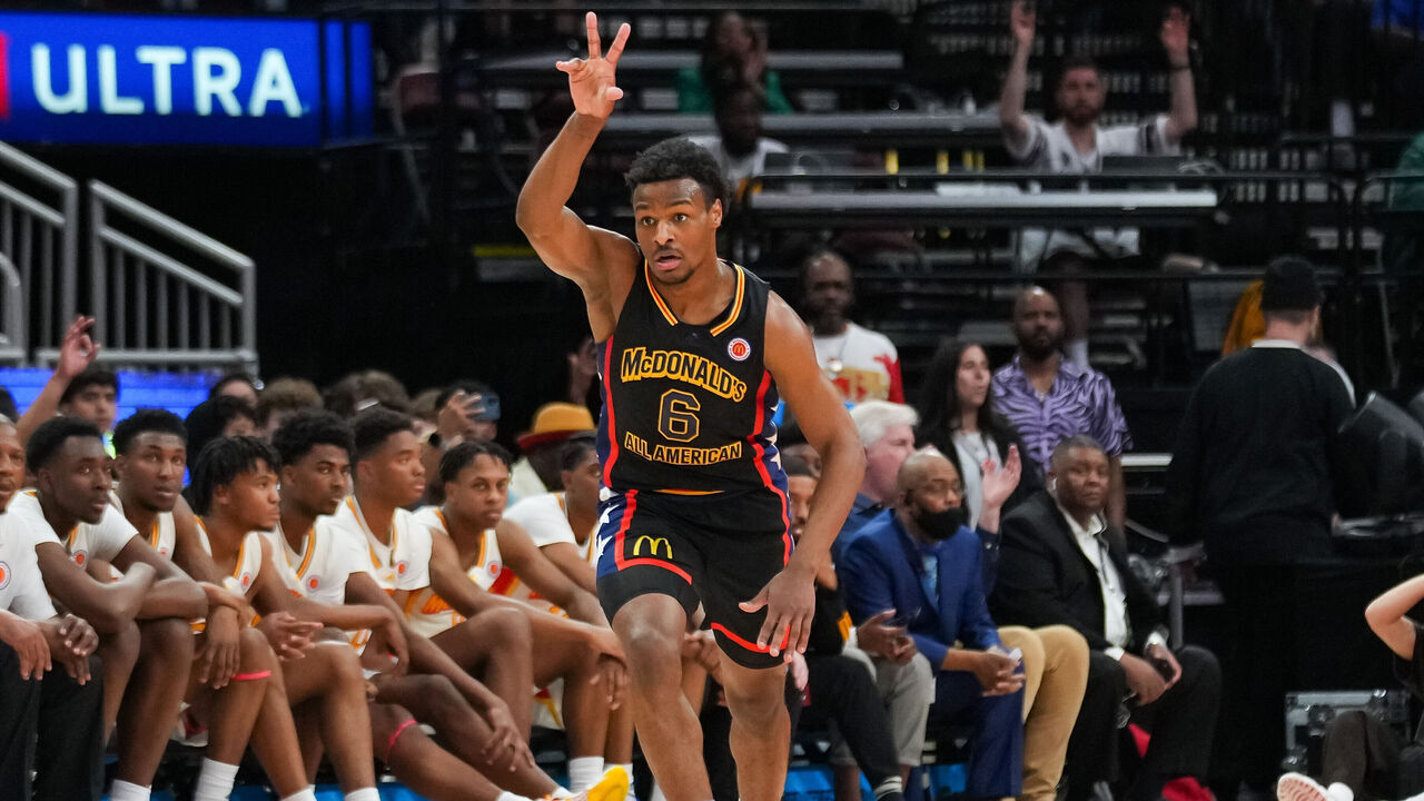 HOUSTON, TEXAS - MARCH 28: Bronny James #6 of the West team reacts after sinking a three point shot during the 2023 McDonald's High School Boys All-American Game at Toyota Center on March 28, 2023 in Houston, Texas.