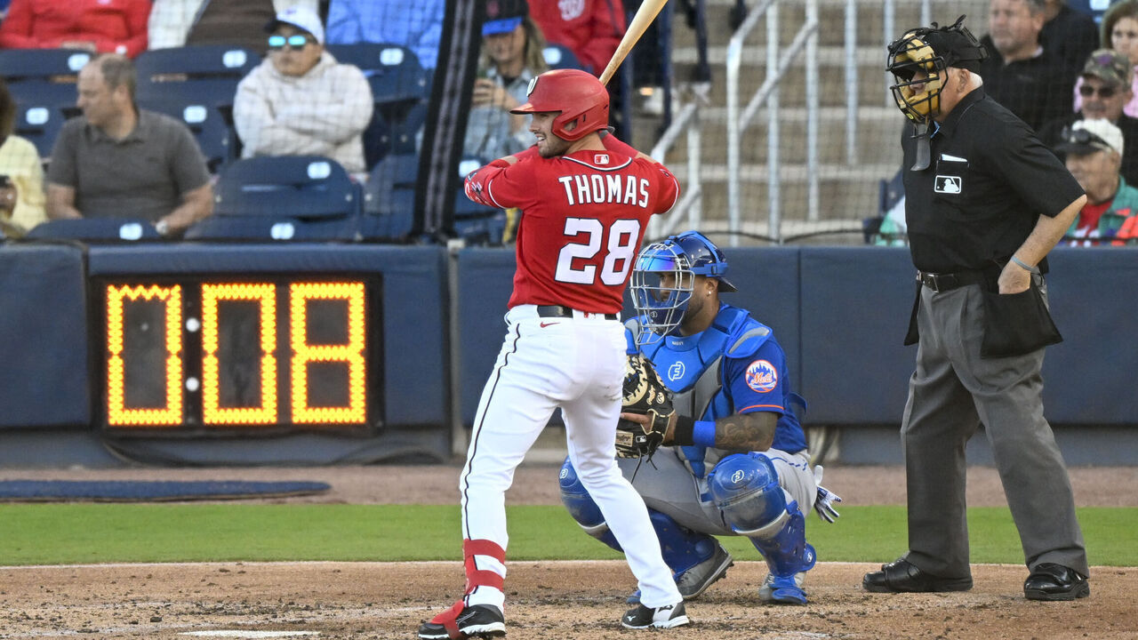 WEST PALM BEACH, FL - MARCH 20: Washington Nationals left fielder Lane Thomas (28) stands in the batters box as New York Mets starting pitcher Justin Verlander (35) has 8 seconds on the pitch clock at The Ballpark of the Palm Beaches on March 20, 2023.
