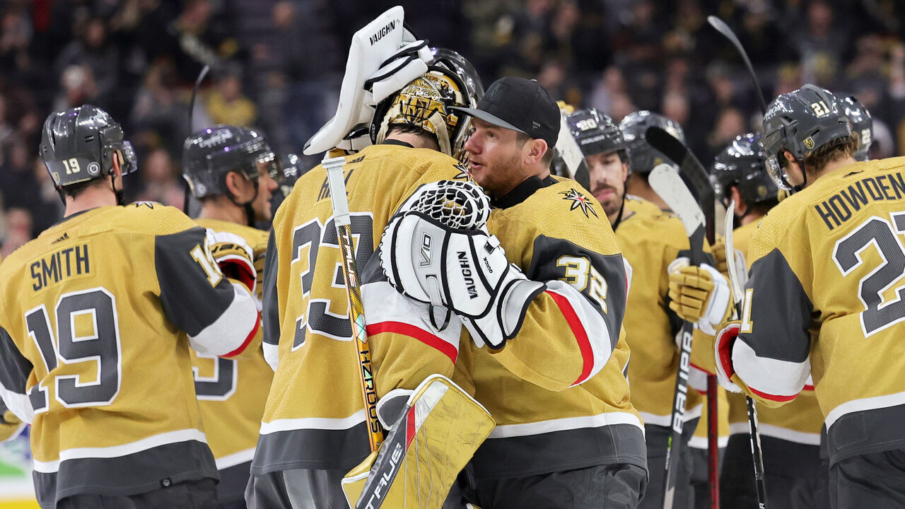 LAS VEGAS, NEVADA - MARCH 03: Adin Hill #33 and Jonathan Quick #32 of the Vegas Golden Knights celebrate on the ice after the team's 4-3 shootout victory over the New Jersey Devils at T-Mobile Arena on March 03, 2023 in Las Vegas, Nevada.