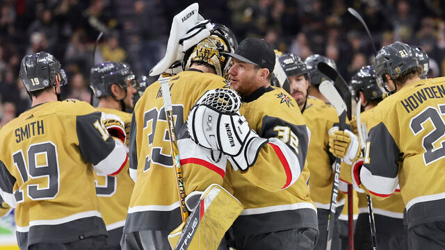 LAS VEGAS, NEVADA - MARCH 03: Adin Hill #33 and Jonathan Quick #32 of the Vegas Golden Knights celebrate on the ice after the team's 4-3 shootout victory over the New Jersey Devils at T-Mobile Arena on March 03, 2023 in Las Vegas, Nevada.
