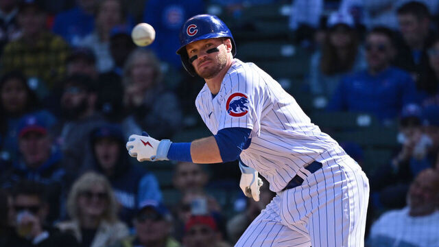 CHICAGO, IL - OCTOBER 2: Ian Happ #8 of the Chicago Cubs bats against the Cincinnati Reds at Wrigley Field on October 2, 2022 in Chicago, Illinois.